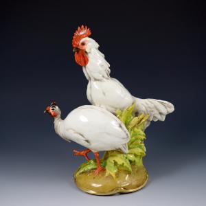 Hahn mit Perlhuhn